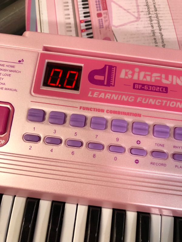 Photo 2 of *NO MICROPHONE/ USED*** WOSTOO Kids Keyboard Piano,61 Keys-Pink