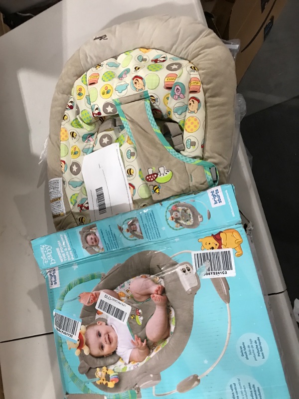 Photo 2 of Bright Starts Winnie the Pooh Dots & Hunny Pots Baby Bouncer with Vibrating Infant Seat, Music & 3 Playtime Toys, 23x19x23 Inch