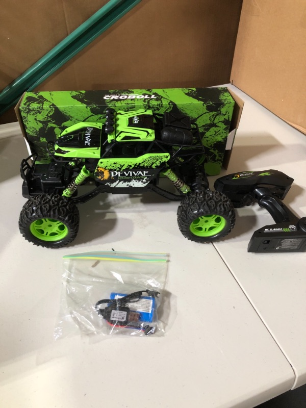 Photo 2 of CROBOLL 1:12 Large Remote Control Car for Boys with Upgraded Lifting Function, 4WD 20km/h RC Car Toys for Kids 4X4 Off-Road RC Rock Crawler, 2.4GHz All Terrain RC Monster Truck for 60Mins Play(Green)