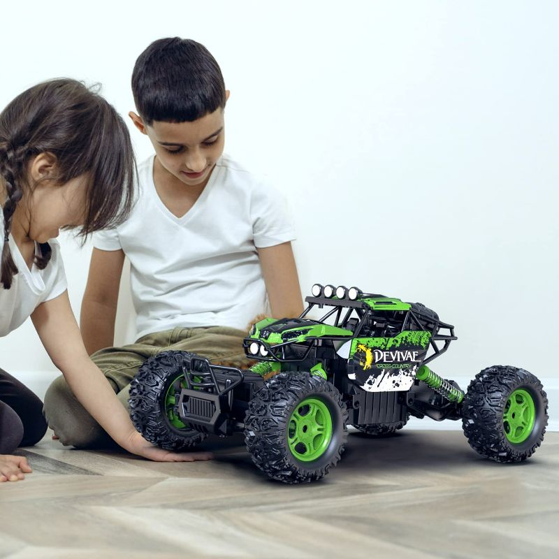 Photo 1 of CROBOLL 1:12 Large Remote Control Car for Boys with Upgraded Lifting Function, 4WD 20km/h RC Car Toys for Kids 4X4 Off-Road RC Rock Crawler, 2.4GHz All Terrain RC Monster Truck for 60Mins Play(Green)