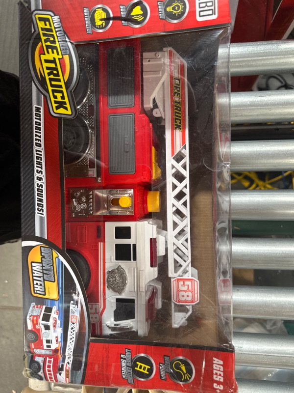Photo 1 of **SEE NOTES** Fire Truck Motorized with Lights, Siren Sound, Working Water Pump and Rotating Rescue Ladder, Kids