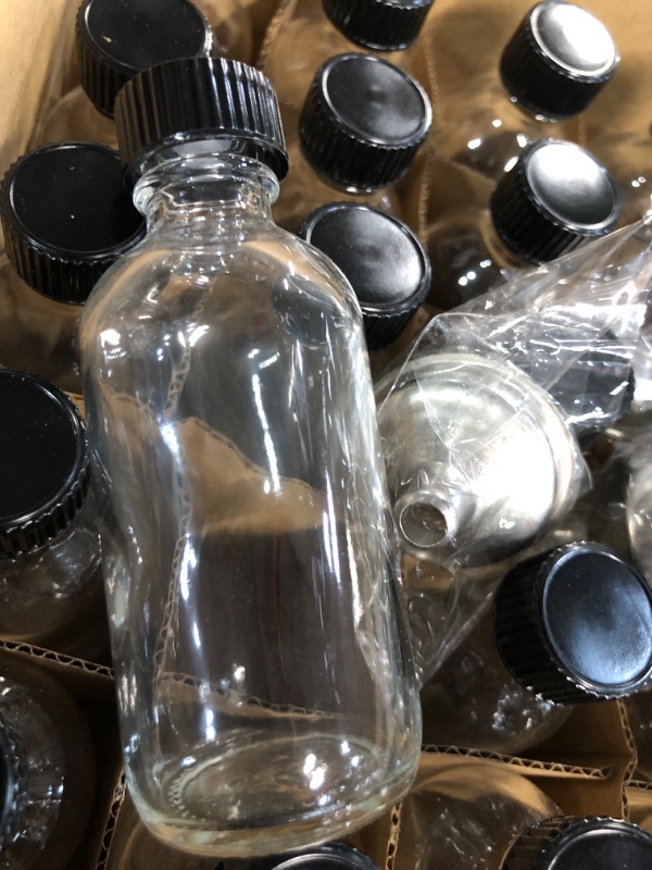 Photo 1 of 24, 2 oz Small Clear Glass Bottles (60ml) with Lids & 3 Stainless Steel Funnels - Boston Round Sample Bottles