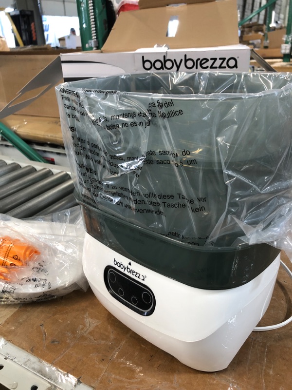 Photo 2 of Baby Brezza Baby Bottle Sterilizer and Dryer Advanced – Electric Steam Sterilization Machine – Universal Sterilizing: Plastic + Glass + Pacifiers + Breast Pump Parts - HEPA Filtration