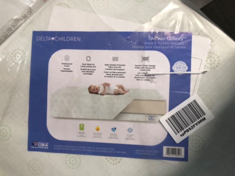 Photo 3 of Delta Children Twinkle Galaxy Dual Sided Crib and Toddler Mattress 