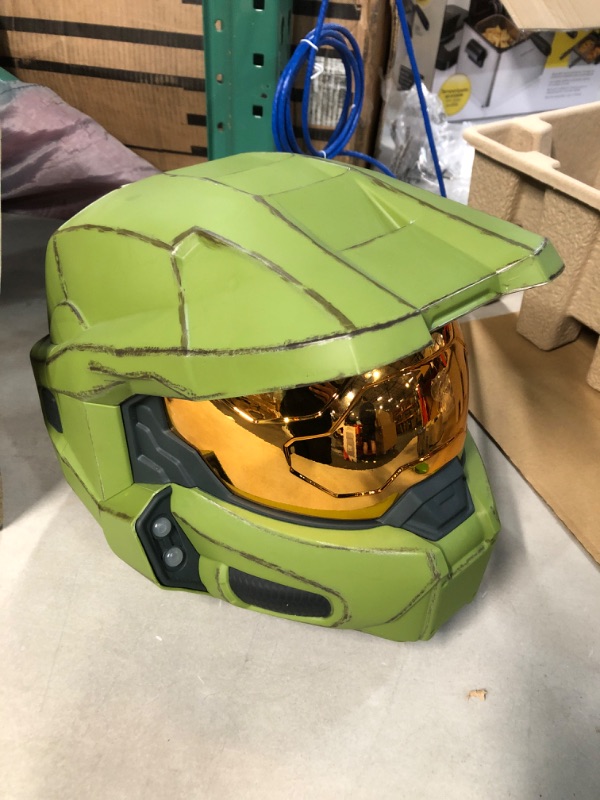 Photo 2 of HALO Master Chief Deluxe Helmet with Stand - LED Lights on Each Side - Battle Damaged Paint - One Size Fits Most - Build Your Halo Universe, Green