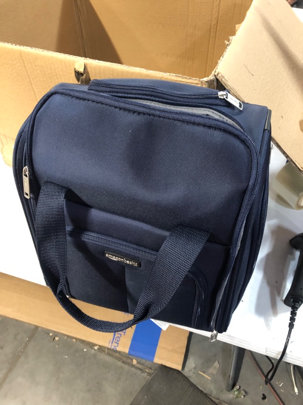 Photo 1 of Amazon Basics Underseat Carry-On Rolling Travel Luggage Bag, 14 Inches, Navy Blue
