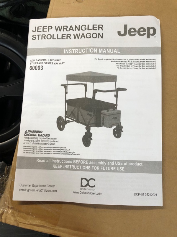 Photo 2 of **MISSING 2 WHEELS**
Jeep Deluxe Wrangler Stroller Wagon by Delta Children Black/Green
