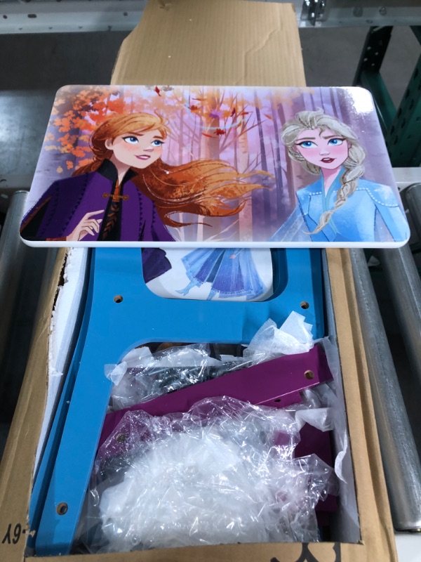 Photo 2 of Disney Frozen Kids Wood Art Desk and Chair Set with Dry Erase Top and Reusable Vinyl Cling Stickers by Delta Children - Greenguard Gold Certified