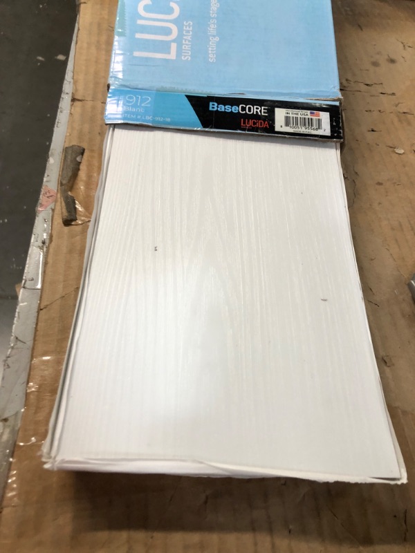 Photo 4 of ***PACK OF 3**Lucida Surfaces BaseCore 6 in. W x 36 in. L Blanc Peel and Stick Luxury Vinyl Plank Flooring (54 Sq. ft./Case)