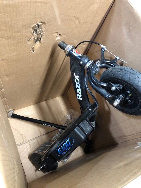 Photo 4 of * USED * Razor E100 Electric Scooter for Kids Ages 8+ - 8" Pneumatic Front Tire, Hand-Operated Front Brake, Up to 10 mph and 40 min of Ride Time, For Riders up to 120 lbs