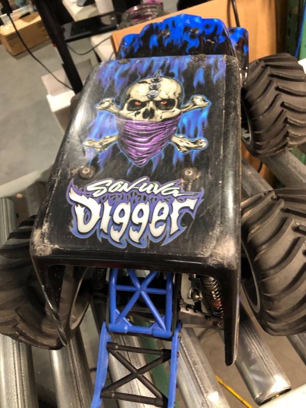 Photo 6 of * MAJOR DAMAGE * Losi RC Truck LMT 4 Wheel Drive Solid Axle Monster Truck RTR Battery and Charger Not Included Son-uva Digger LOS04021T2 Blue