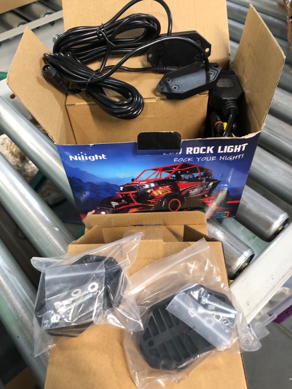 Photo 2 of Nilight RGB LED Rock Lights Kit, 4 pods Underglow Multicolor Neon Light Pod & Sasquatch Lights Rocker Switch 5Pin Laser On/Off LED Light