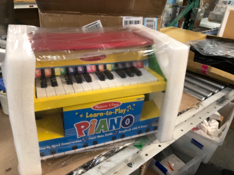 Photo 2 of **BRAND NEW** Melissa & Doug Learn-To-Play Piano With 25 Keys and Color-Coded Songbook - Toy Piano