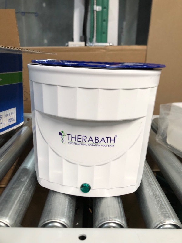 Photo 1 of **USED** herabath Unit with 6 lbs. Wintergreen Paraffin Wax