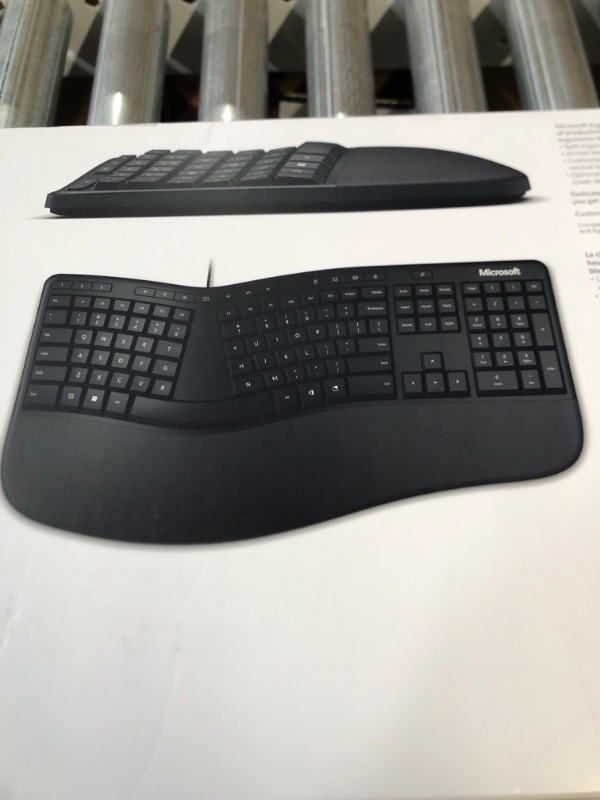 Photo 3 of Microsoft Ergonomic Keyboard - Black. Wired, Comfortable, Ergonomic Keyboard with Cushioned Wrist and Palm Support. Split Keyboard. Dedicated Office Key.