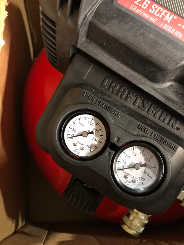 Photo 3 of * DAMAGED * CRAFTSMAN Air Compressor, 6 Gallon, Pancake, Oil-Free with 13 Piece Accessory Kit (CMEC6150K)