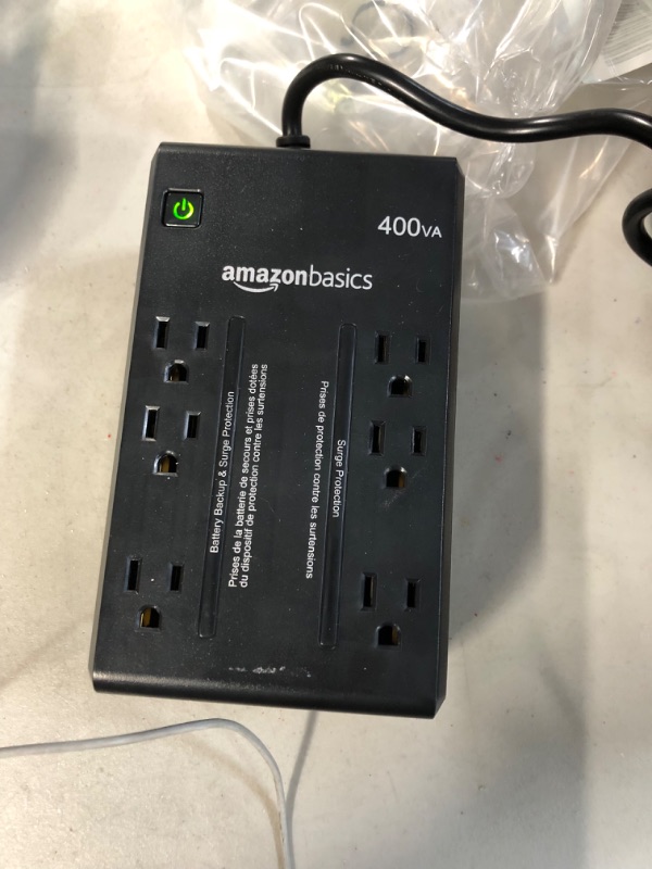 Photo 2 of Amazon Basics Standby UPS 400VA 255W Surge Protector Battery Power Backup, 6 Outlets - Black