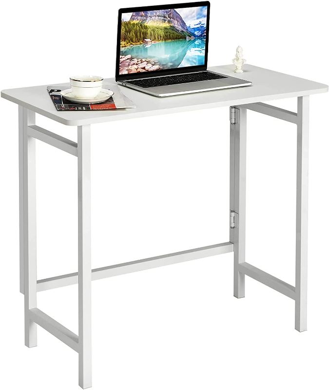 Photo 1 of Tangkula White Folding Desk, Compact Computer Desk ***LOOKIS BRAND NEW***
