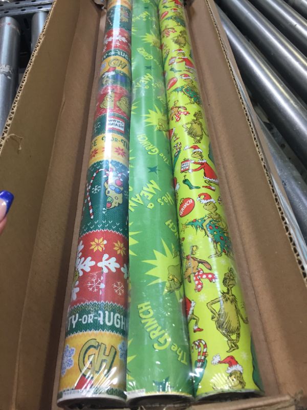 Photo 3 of American Greetings Christmas Wrapping Paper with Cut Lines Bundle, The Grinch (3 Rolls, 105 sq. ft.)