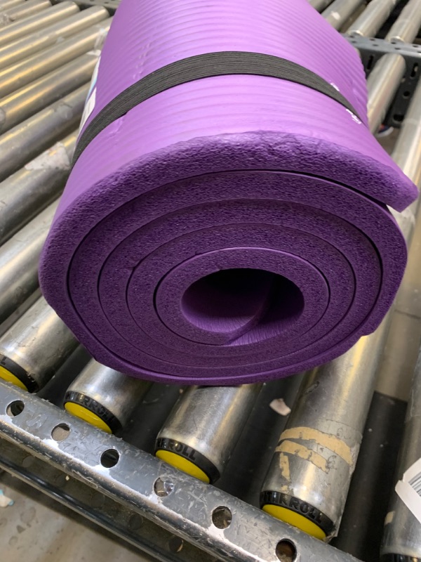 Photo 4 of Amazon Basics Extra Thick Exercise Yoga Gym Floor Mat with Carrying Strap - 74 x 24 x .5 Inches, Purple & High-Density  --- No Box Packaging, Moderate Use, Slightly Dirty From Previous Use, Indents in Foam From Previous Use