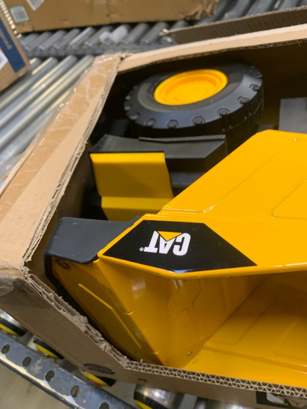 Photo 1 of Cat Construction Steel Toy Dump Truck, Yellow Steel Dump Truck --- Box Packaging Damaged, Minor Use
