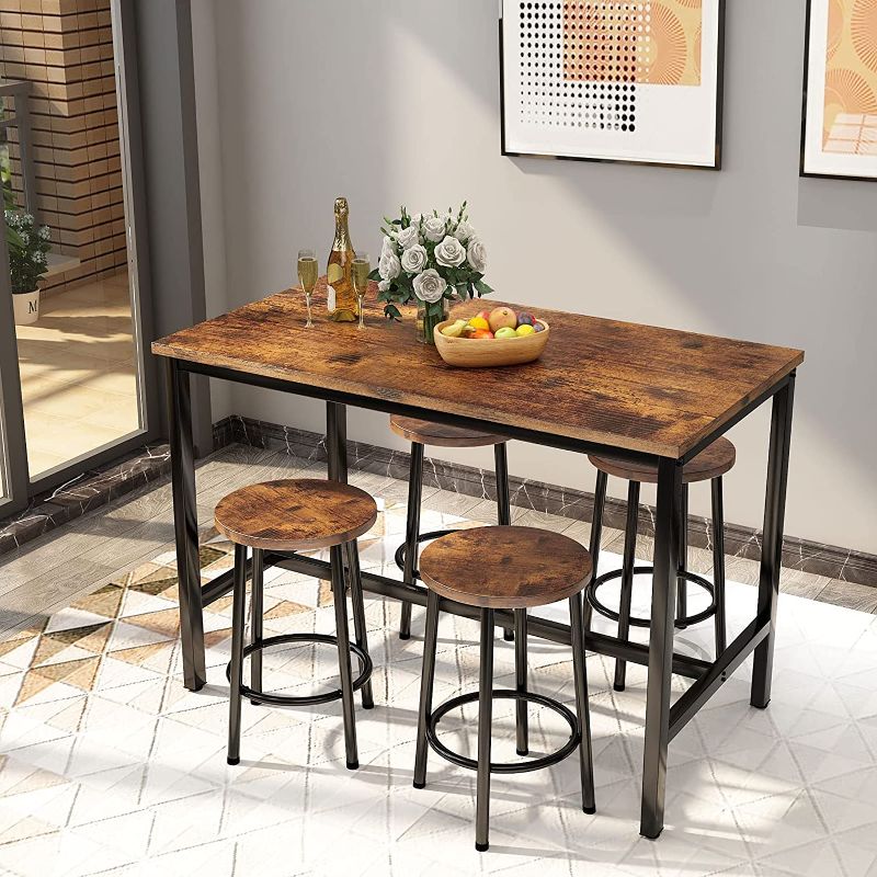 Photo 1 of AWQM Bar Table and Chairs Set Industrial Counter Height Pub Table with 4 Chairs Bar Table Set 5 Pieces Dining Table Set Home Kitchen Breakfast Table, Rustic Brown --- Box Packaging Damaged, Moderate Use, Scratches and Scuffs on Item as Shown in Pictures, 
