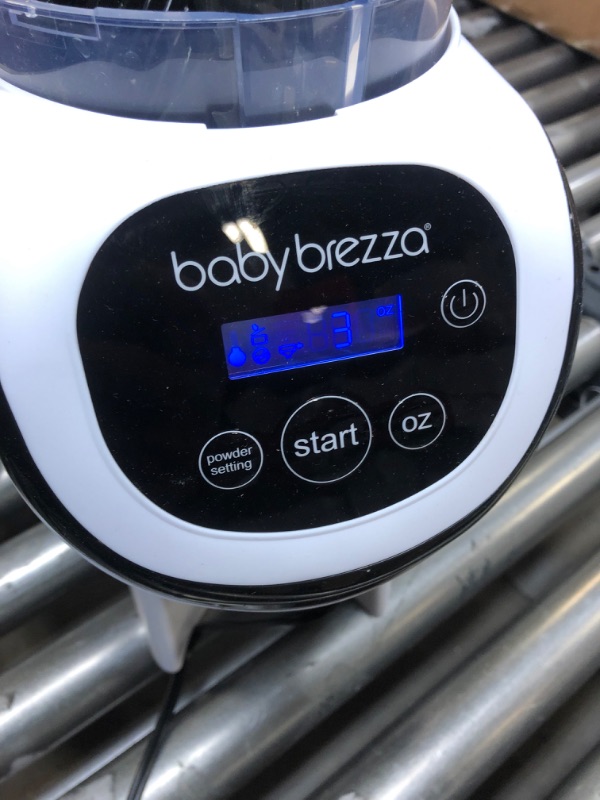 Photo 2 of Baby Brezza Formula Pro Mini Baby Formula Maker – Small Baby Formula Mixer Machine Fits Small Spaces and is Portable for Travel– Bottle Makers Makes The Perfect Bottle for Your Infant On The Go---------missing lid 