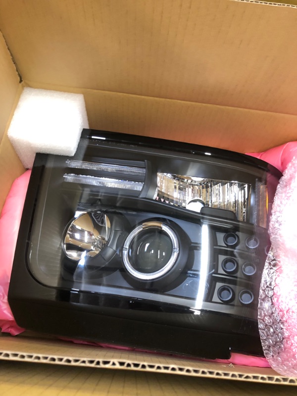 Photo 1 of AnzoUSA 111184 Black Projector Halo Headlight with Side Marker and Parking Light for Ford F-150/F-250/Bronco - (Sold in Pairs)-------Lightly used---------missing some items and hardware/screws 