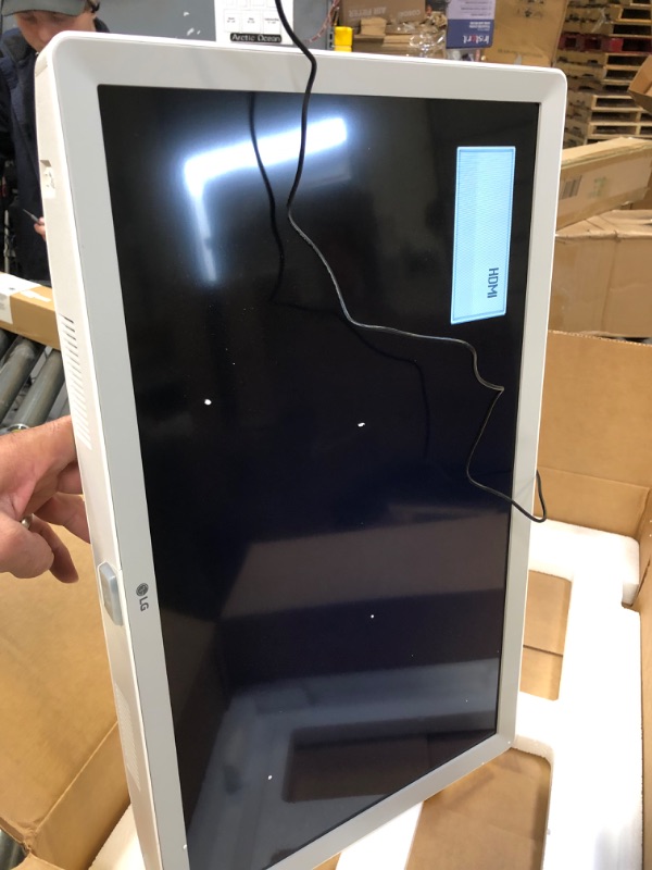 Photo 1 of LG LED TV 24" HD 720p TV/Monitor, Slim, compact design, Built-in speaker (3W x 2), Triple XD Engine, Remote Control, Wall Mountable - White 24 in----there are some finger prints on the screen 