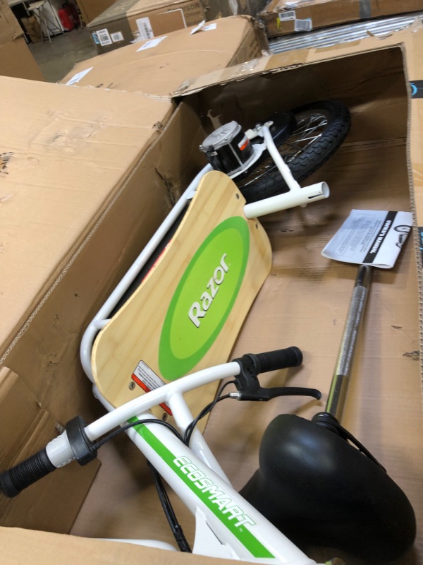 Photo 9 of Razor EcoSmart Metro Electric Scooter – Padded Seat, Wide Bamboo Deck, 16" Air-Filled Tires, 500w High-Torque Motor, Up to 18 mph, 12-Mile Range, Rear-Wheel Drive------THERE ARE SOME SCRATCHES BUTY THE BIKE IS NEW -----MISSING POWER CORD UNABLE TO TEST 
