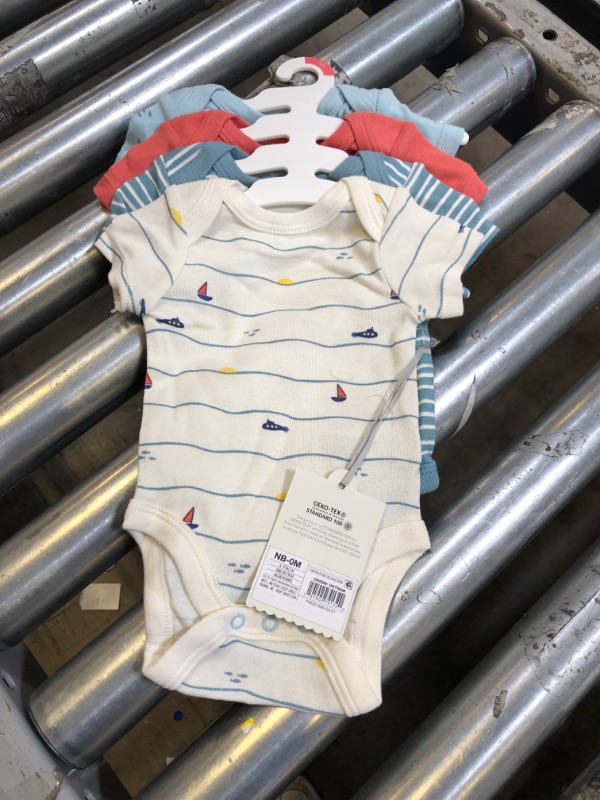 Photo 1 of Baby Boys' 4pk Sweet Seaside Short Sleeve Bodysuit - Cloud Island™ Blue
NEWBORN - 0 MONTHS