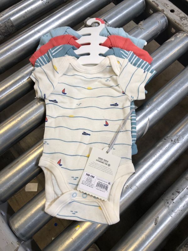 Photo 2 of Baby Boys' 4pk Sweet Seaside Short Sleeve Bodysuit - Cloud Island™ Blue
NEWBORN - 0 MONTHS