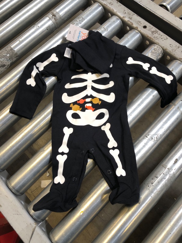 Photo 1 of NEWBORN SKELETON ONESIE WIHT HAT 