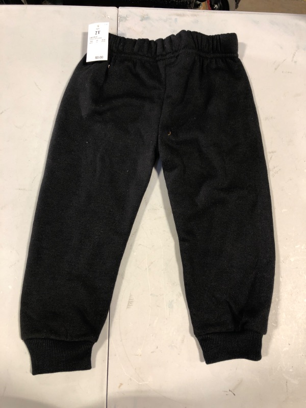 Photo 1 of 2 T ----- Black pants 