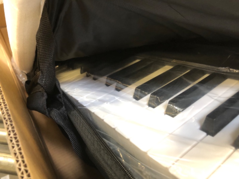 Photo 1 of Finger Dance Folding Piano 88 key keyboard Digital Piano with MIDI Portable 88 Key Full Size Upgrade Wood Grain Semi-Weighted Keyboard Piano with Lighted Keys for Beginners Deep Black-Lighted