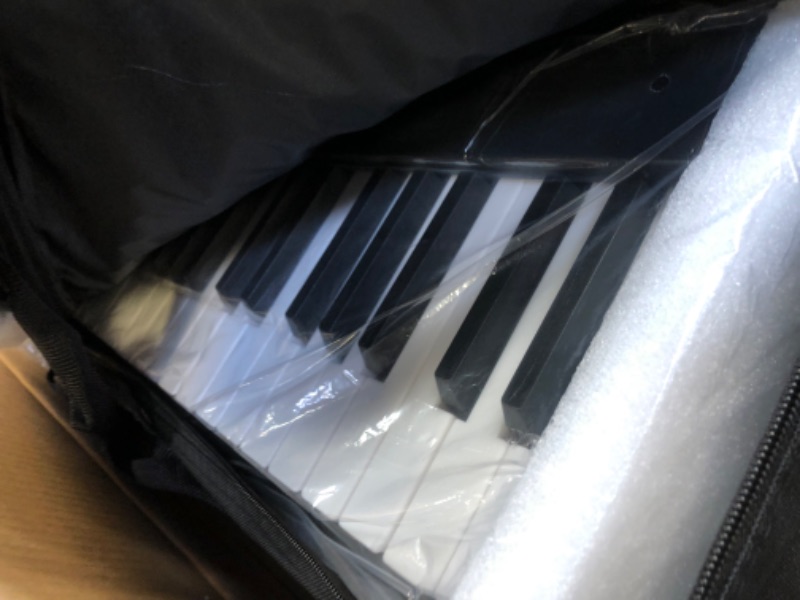 Photo 1 of Finger Dance Folding Piano 88 key keyboard Digital Piano with MIDI Portable 88 Key Full Size Upgrade Wood Grain Semi-Weighted Keyboard Piano with Lighted Keys for Beginners Deep Black-Lighted