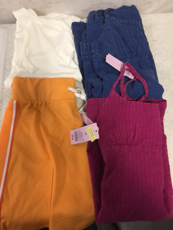 Photo 1 of FOUR PIECES OF BRAND NEW CLOTHES -- SIZES/STYLES VARY 