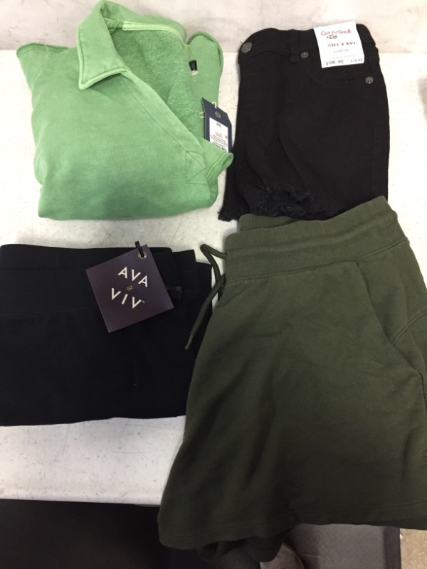 Photo 1 of FOUR PIECES OF BRAND NEW CLOTHES -- SIZES/STYLES VARY 
