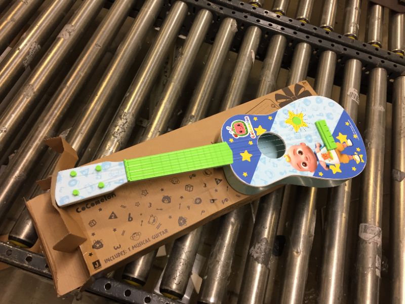 Photo 2 of CoComelon Musical Guitar by First Act, 23.5” Kids Guitar - Plays Clips of The ‘Finger Family’ Song - Musical Instruments for Kids, Toddlers, and Preschoolers