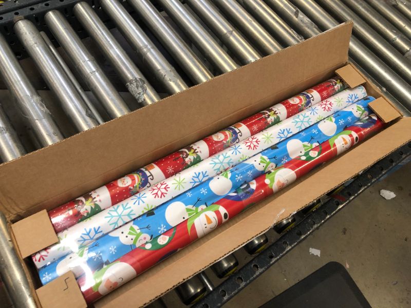 Photo 2 of American Greetings Christmas Reversible Wrapping Paper Bundle, Santa, Snowflakes and Snowmen (4 Rolls, 160 sq. ft.)