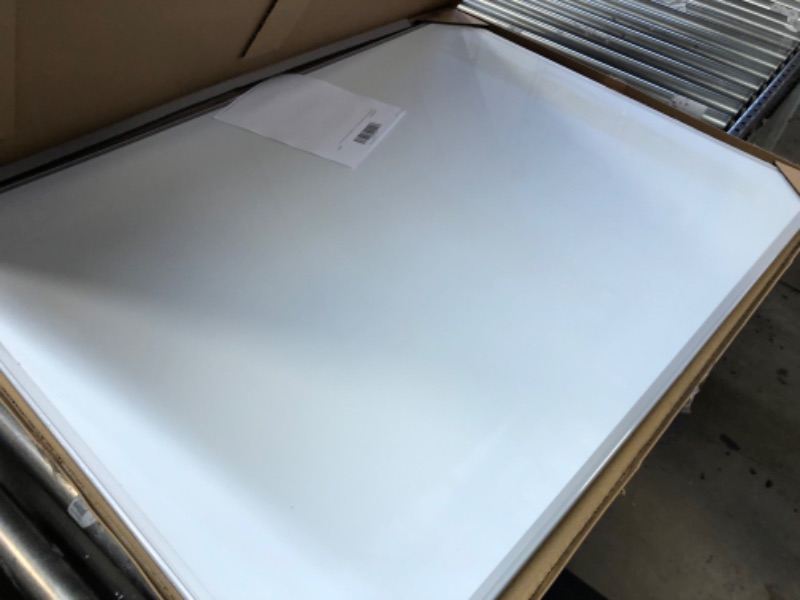 Photo 2 of Amazon Basics Magnetic Dry Erase White Board, 35 x 47-Inch Whiteboard - Silver Aluminum Frame 35" x 47" Magnetic, Aluminum Frame