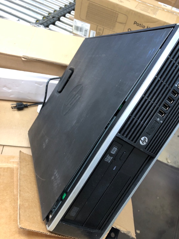 Photo 4 of HP Compaq Pro SFF Business PC,AMD A6-5400B 3.6G, 12G DDR3, 2T HDD, DVDRW, WiFi, BT 4.0, VGA, DP, Win 10 64 Bit-Multi Language (Renewed)--------Cover is coming off on the side due to transit-------missing most items 