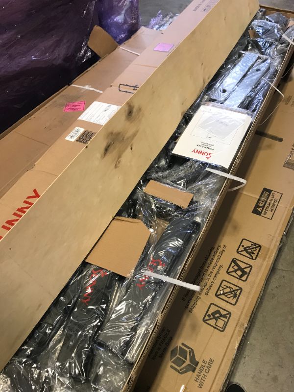 Photo 1 of Sunny Health & Fitness Power and Squat Rack with High Weight Capacity, Olympic Weight Plate Storage and 360° Swivel Landmine and Power Band Attachment -- FACTORY STRAPPED / SEALED
