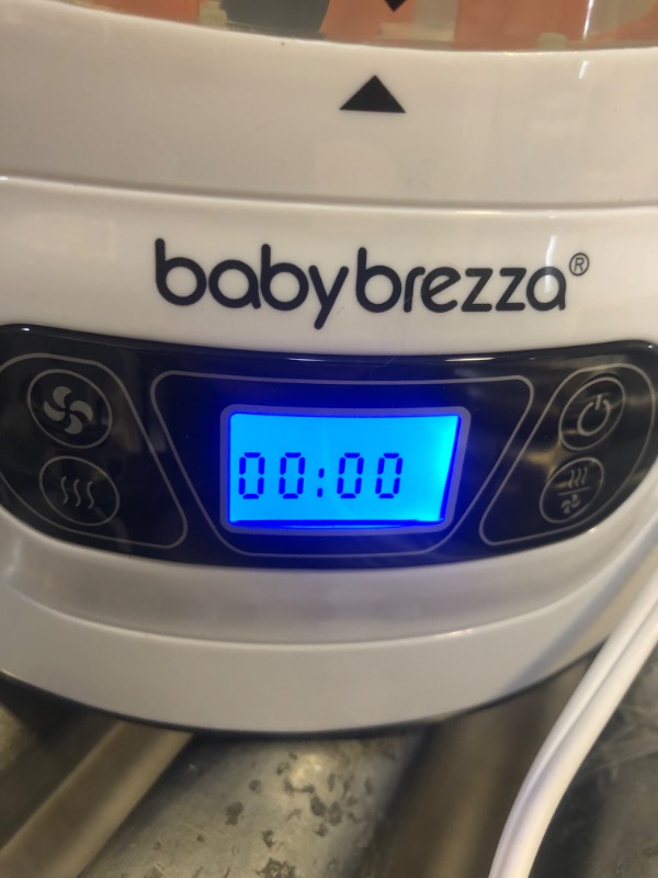 Photo 4 of Baby Brezza Baby Bottle Sterilizer and Dryer Machine – Electric Steam Sterilization - Universal Fit - Pacifiers, Glass, Plastic, and Newborn Feeding Bottles