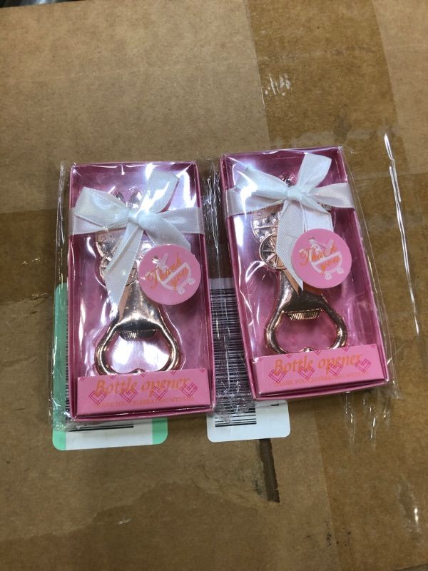 Photo 1 of Baby shower pink bottle opener set of 2