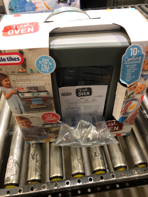 Photo 1 of Little Tikes First Oven Realistic Pretend Play Appliance for Kids, Play Kitchen with 11 Accessories and Realistic Cooking Sounds, Unique Toy Multi-Color, Ages 2+