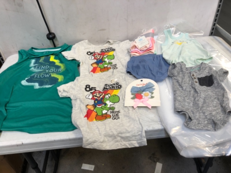 Photo 1 of BAG LOT, ASSORTED KIDS' AND TODDLER CLOTHES BUNDLE, VARIOUS SIZES AND COLORS, SOLD AS IS