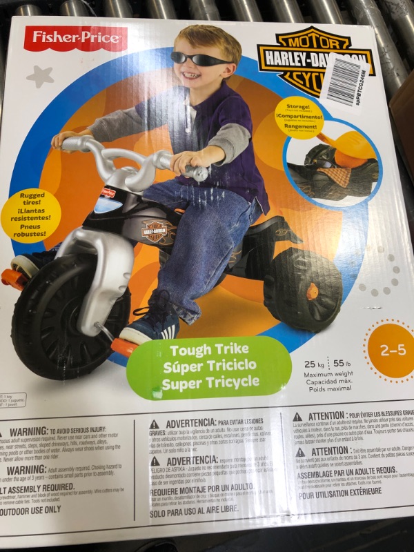 Photo 2 of Fisher-Price Harley-Davidson Tricycle with Handlebar Grips and Storage Area, Multi-Terrain Tires, Tough Trike [Amazon Exclusive]