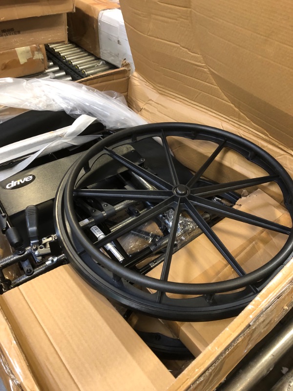 Photo 2 of Drive Medical K320DFA-ELR Cruiser III Lightweight Folding Wheelchair with Flip Back Detachable Full Arms and Elevating Legrest, 1.6 Foot (Pack of 1) Removable Full Arms/Elevating Leg Rests 1.6 Foot (Pack of 1)-------like new 