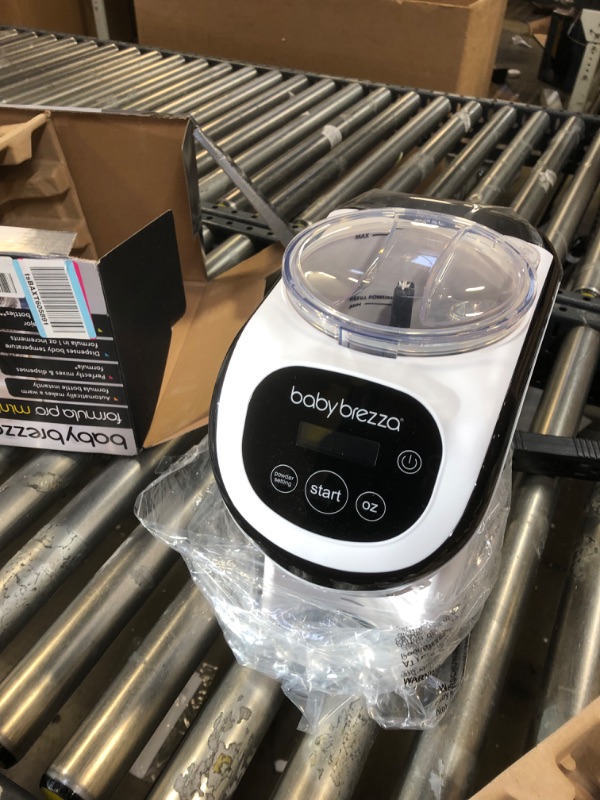 Photo 1 of Baby Brezza Baby Bottle Sterilizer and Dryer Advanced – Electric Steam Sterilization Machine – Universal Sterilizing for All Bottles: Plastic + Glass + Pacifiers + Breast Pump Parts - HEPA Filtration----Lightly used 